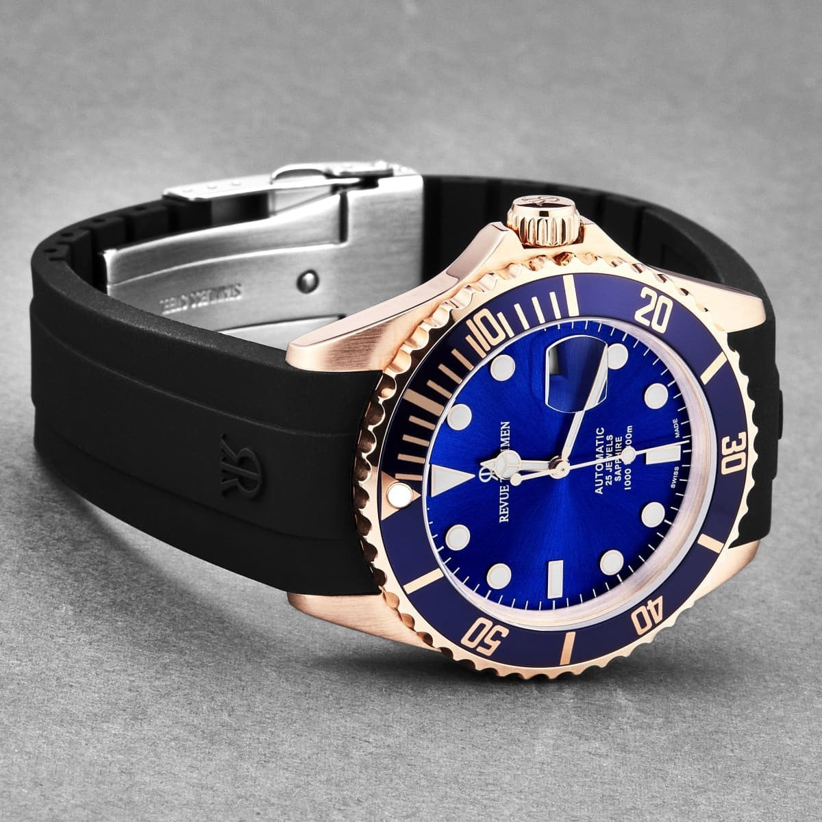 A Revue Thommen Men's 'Diver' Blue Dial Black Rubber Strap Swiss Automatic Watch 17571.2865 with a blue dial and black strap.