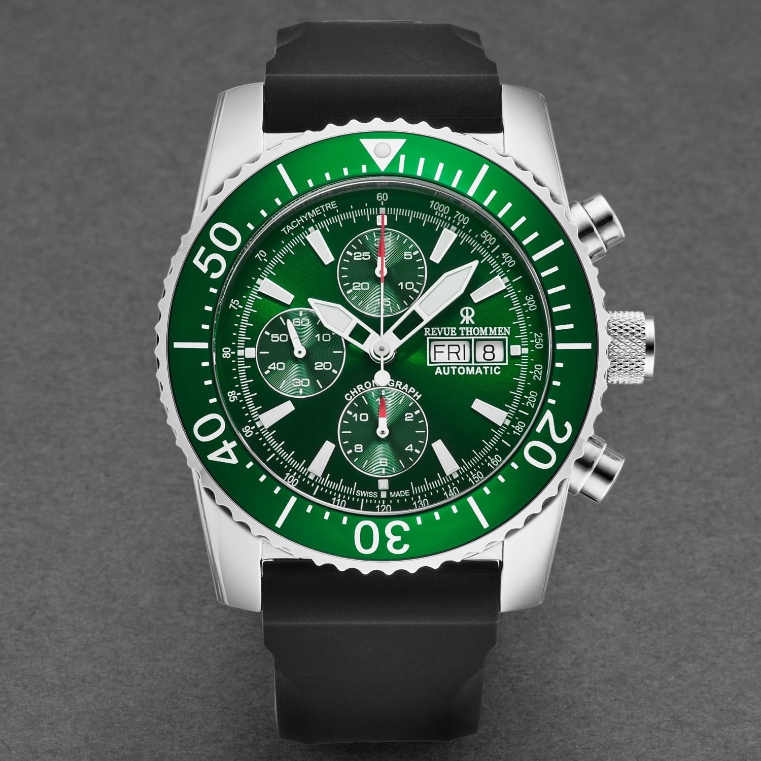 A Revue Thommen Men's 17030.6532 'Divers' Green Dial Day-Date Chronograph Rubber Strap Automatic Watch with green dials on a white background.