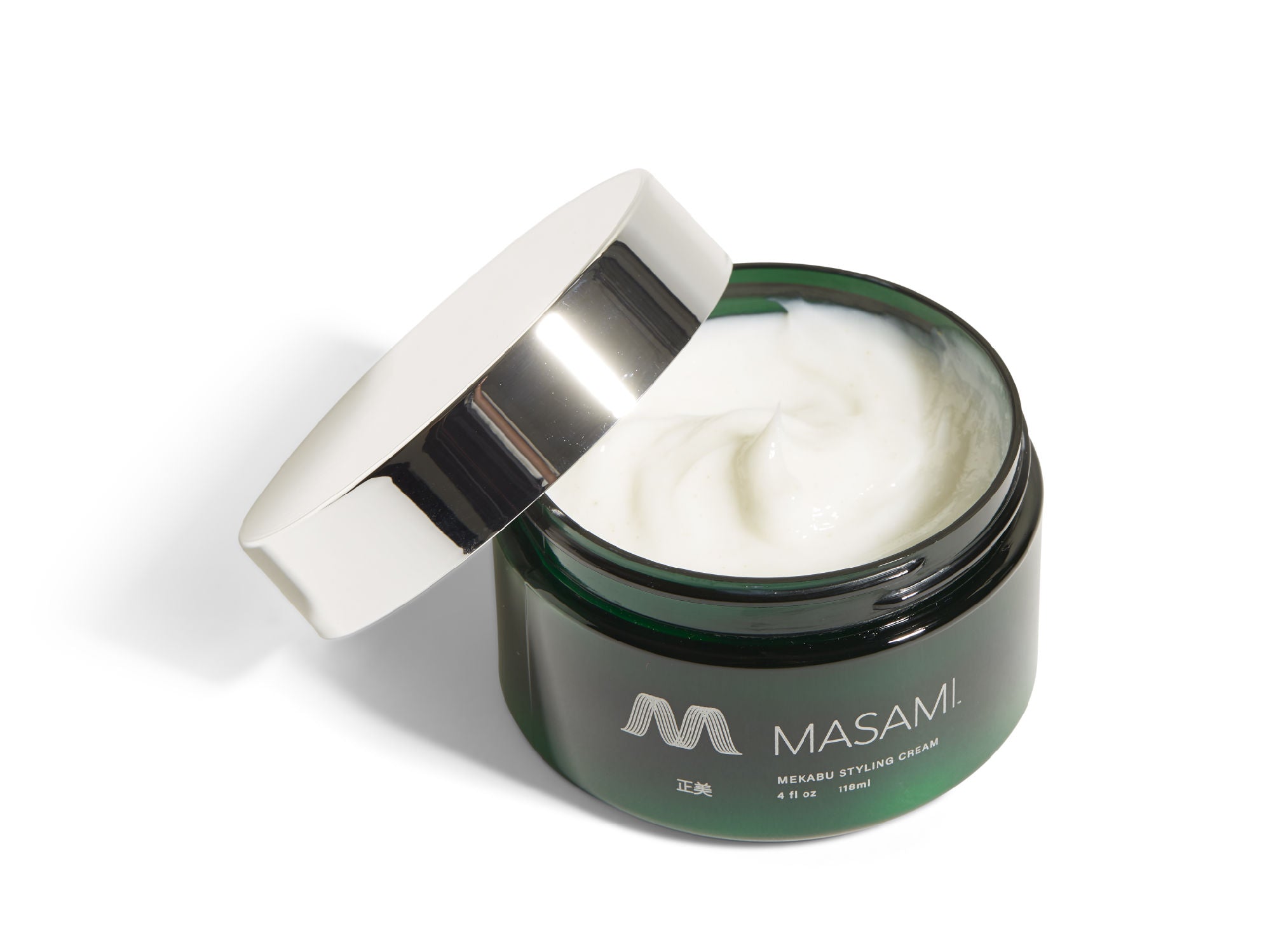 Container of MASAMI Mekabu Hydrating Styling Cream with a blue-green gradient design and silver lid, displaying the brand logo and product information. It is non-greasy.