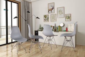 The Set of 4 Modern Style Dining Chairs are mid-century modern side chairs with a black plastic shell lounge design, wooden walnut legs, and metal supports, perfect for your kitchen, dining room, bedroom, or living room.