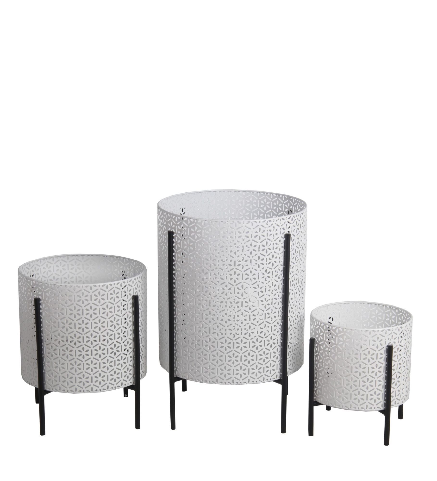 Three Metal Planters with Floral Hexagon Cut Out Design, in varying sizes arranged together.