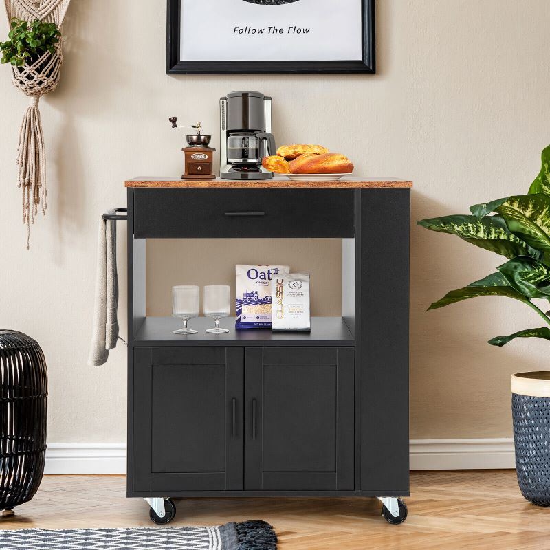 A waterproof Rolling Storage Cabinet Kitchen Cart For Home And Bar Commercial Usage with spacious shelves and bread on it.