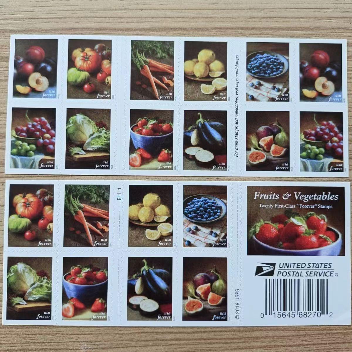 A sheet of Fruits and Vegetables 2020 - 5 Booklets / 100 Pcs stamp booklets featuring colorful images of various fruits and vegetables on a wooden table.