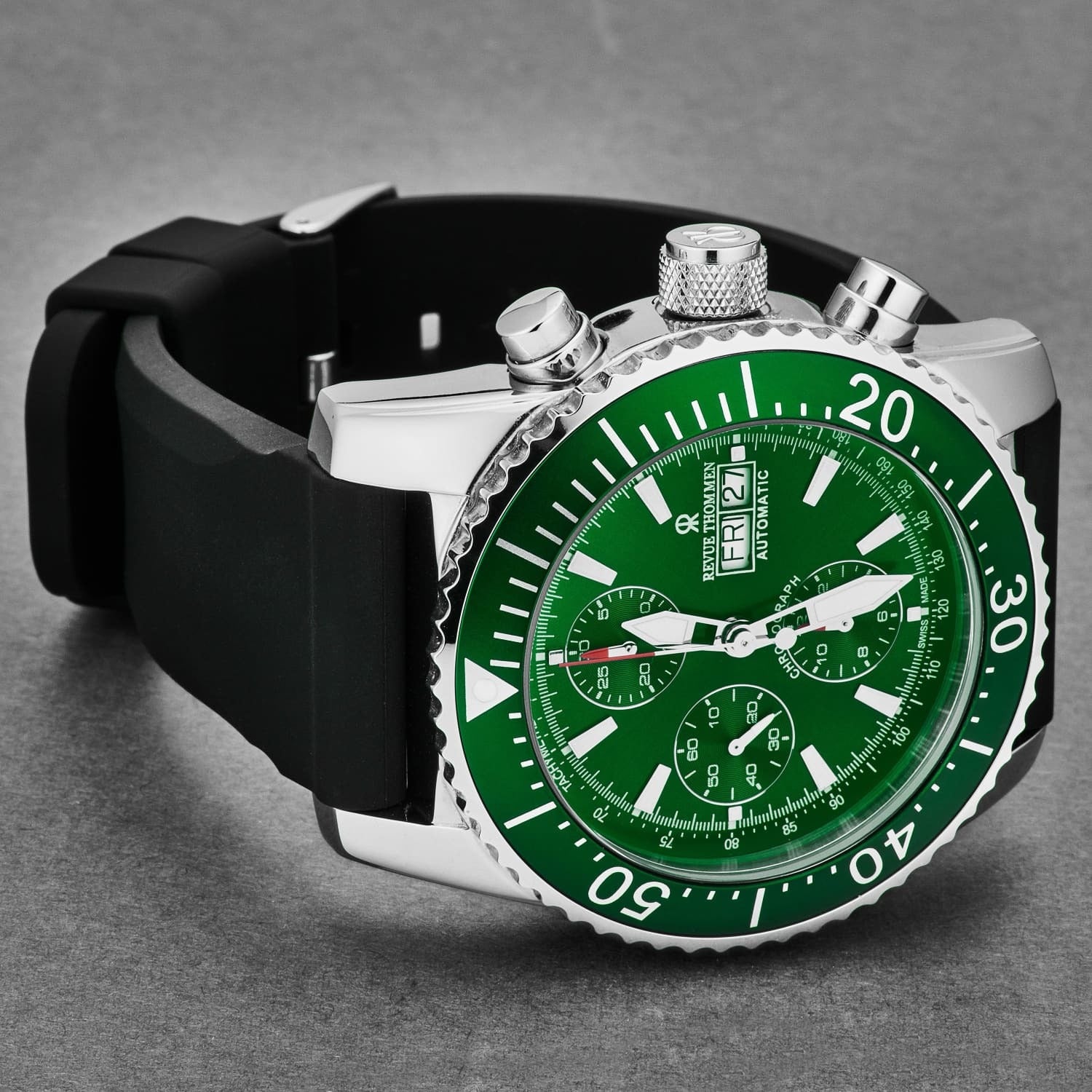 A Revue Thommen Men's 17030.6532 'Divers' Green Dial Day-Date Chronograph Rubber Strap Automatic Watch with green dials on a white background.