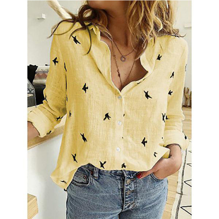 Woman wearing a pink Leisure White Yellow Shirts Button Lapel Cardigan Top with black bird patterns, paired with blue denim jeans, emphasizing the upper body.