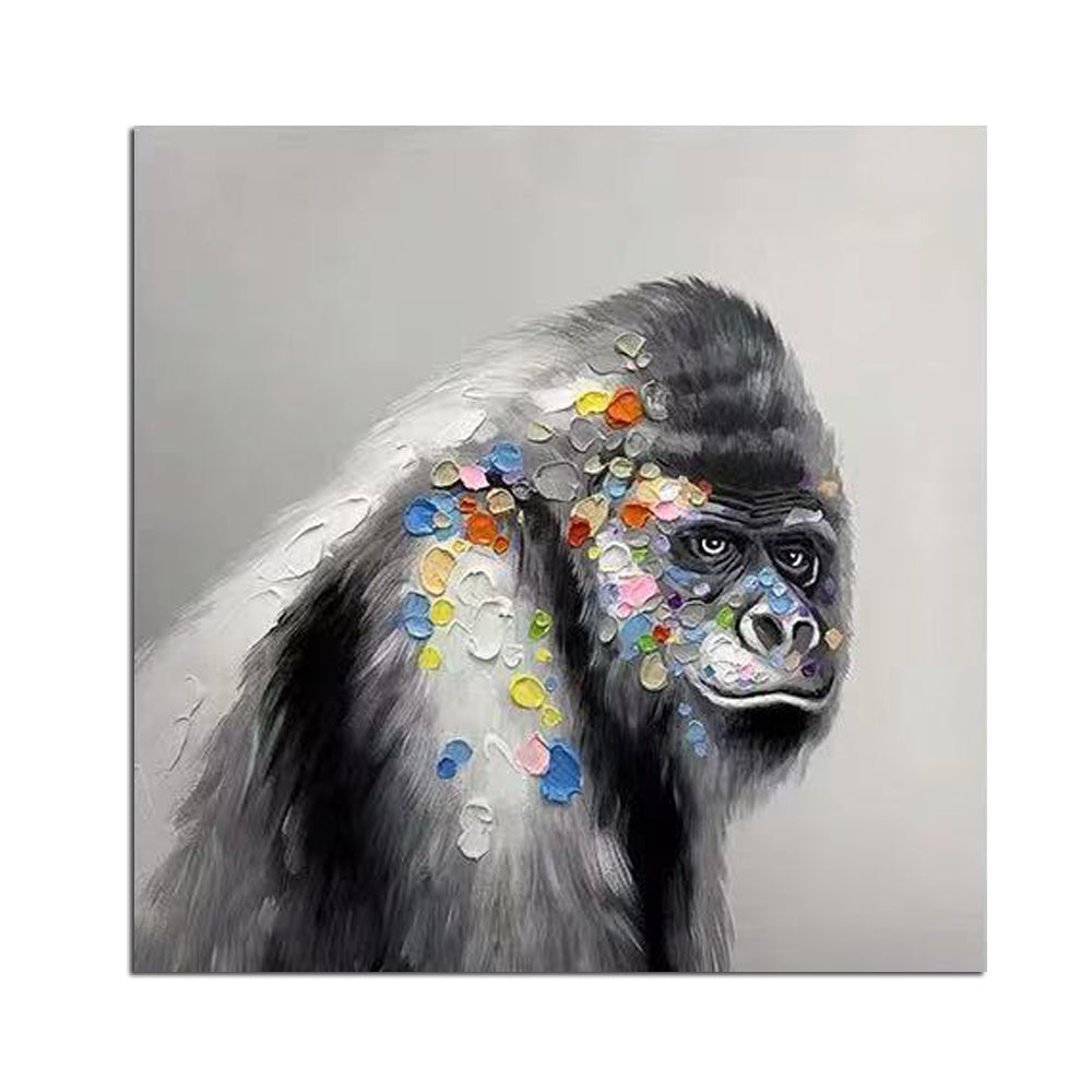 A painting of a gorilla with colorful, abstract oil paint splotches on its head and face, set against a neutral gray background.