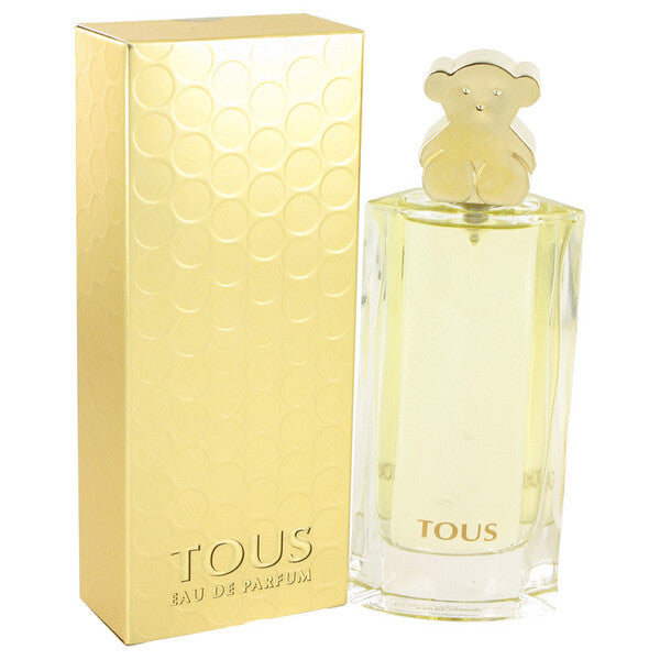 A bottle of Tous Gold Eau De Parfum Spray 1.7 Oz For Women.