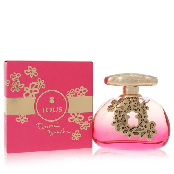 A pink bottle of Tous Floral Touch Eau De Toilette Spray 3.4 Oz For Women edp.