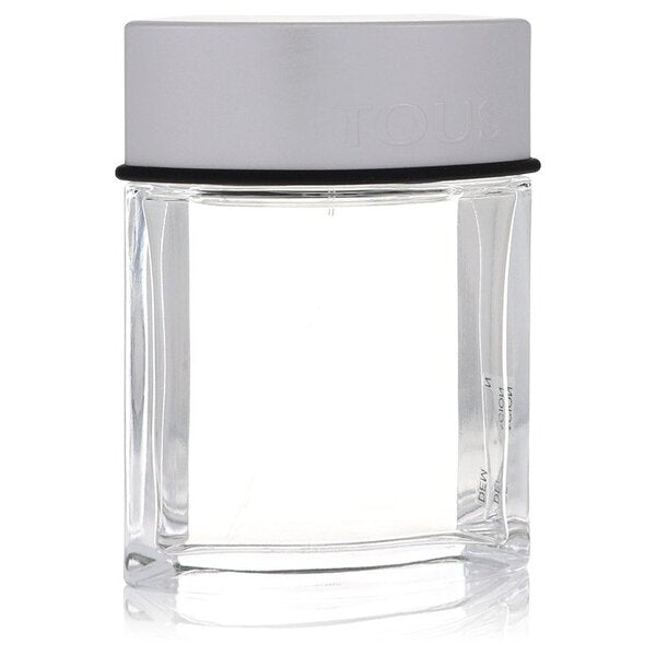A bottle of Tous Eau De Toilette Spray (tester) 3.4 Oz For Men on a white surface.