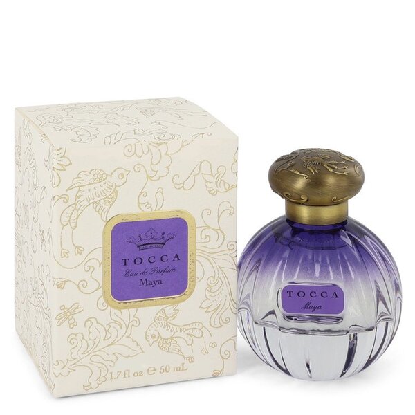 A bottle of Tocca Maya Eau De Parfum Spray 1.7 Oz For Women in front of a box.
