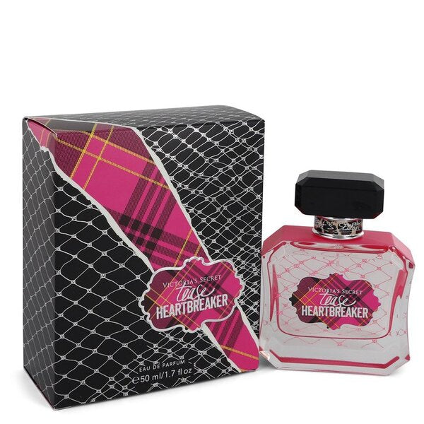 A Victoria's Secret Tease Heartbreaker Eau De Parfum Spray 1.7 Oz For Women with a box in front of it.