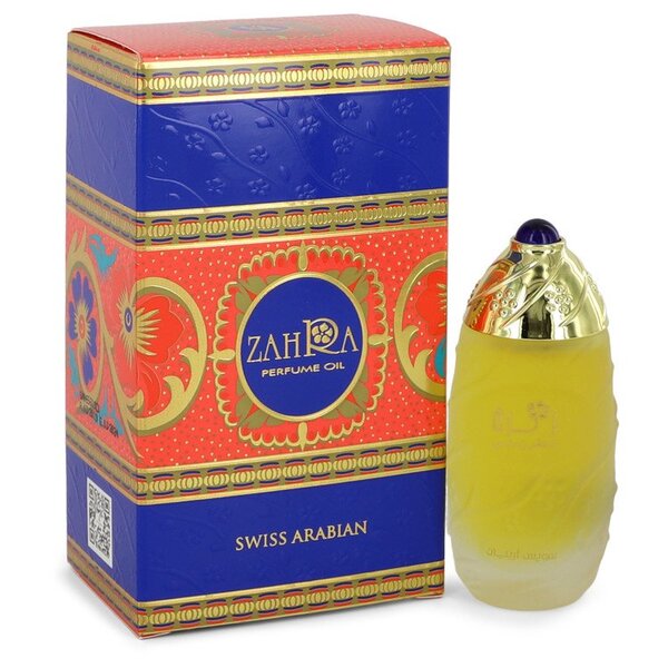 A bottle of Swiss Arabian Zahra Perfume Oil 1 Oz For Women, in front of a blossoming flower.