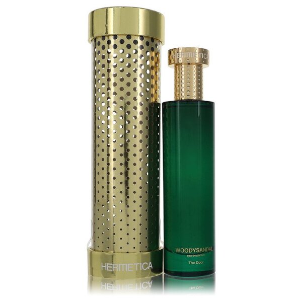 A bottle of Woodysandal Eau De Parfum Spray (unisex) 3.3 Oz For Men with a gold bottle next to it.