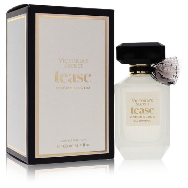 A bottle of Victoria's Secret Tease Creme Cloud Eau De Parfum Spray 3.4 Oz For Women in a box.