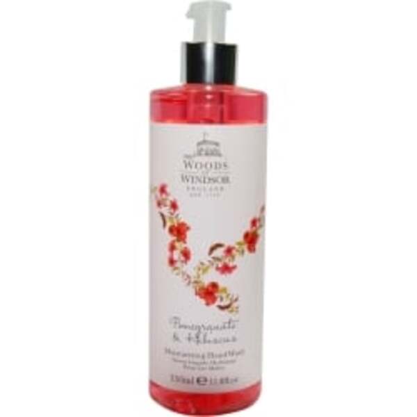 A Woods Of Windsor Pomegranate & Hibiscus hand wash 11.8 oz bottle with roses on it, perfect for women.