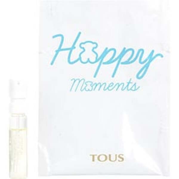 A Tous Happy Moments By Tous Edt Spray Vial On Card For Women with a bag next to it.