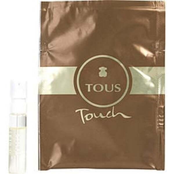 A brown bag with a bottle of Tous Touch By Tous Edt Spray Vial On Card For Women fragrance notes in an EDT spray vial.