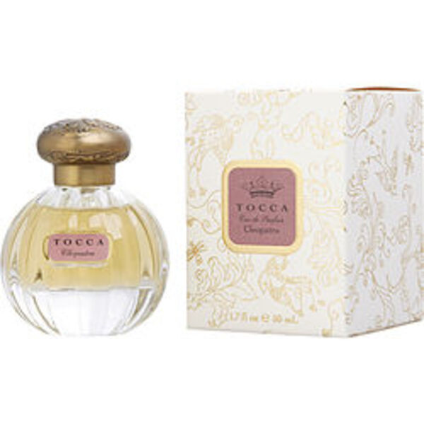 A Tocca Cleopatra By Tocca Eau De Parfum Spray 1.7 Oz For Women bottle with a fragrance notes box next to it.