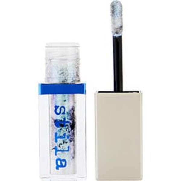 A bottle of Stila By Stila Shade Mystere liquid eye shadow with a blue lid.
