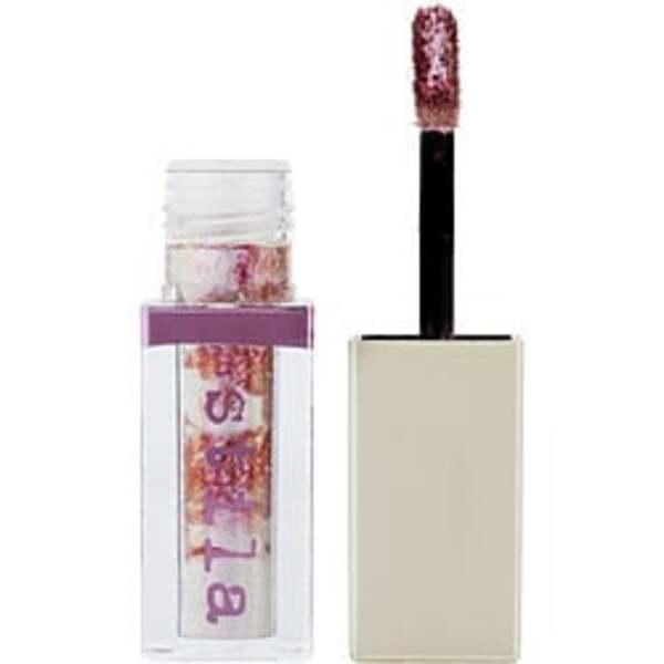 A Stila By Stila Shade Mystere Liquid Eye Shadow - # Charmed --4.4ml/0.15oz For Women with a pink lid.