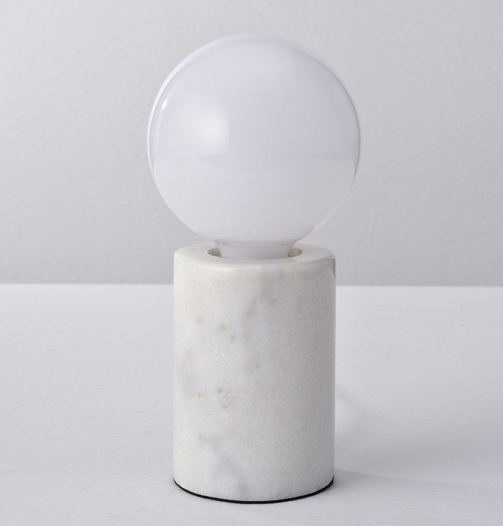 A black Jiar Marble Table Lamp with a white ball on top by ModernMazing.