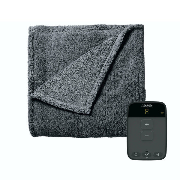 A Sunbeam Full Size Electric Lofttec Heated Blanket in Slate with Wi-Fi Connection with a remote control next to it.