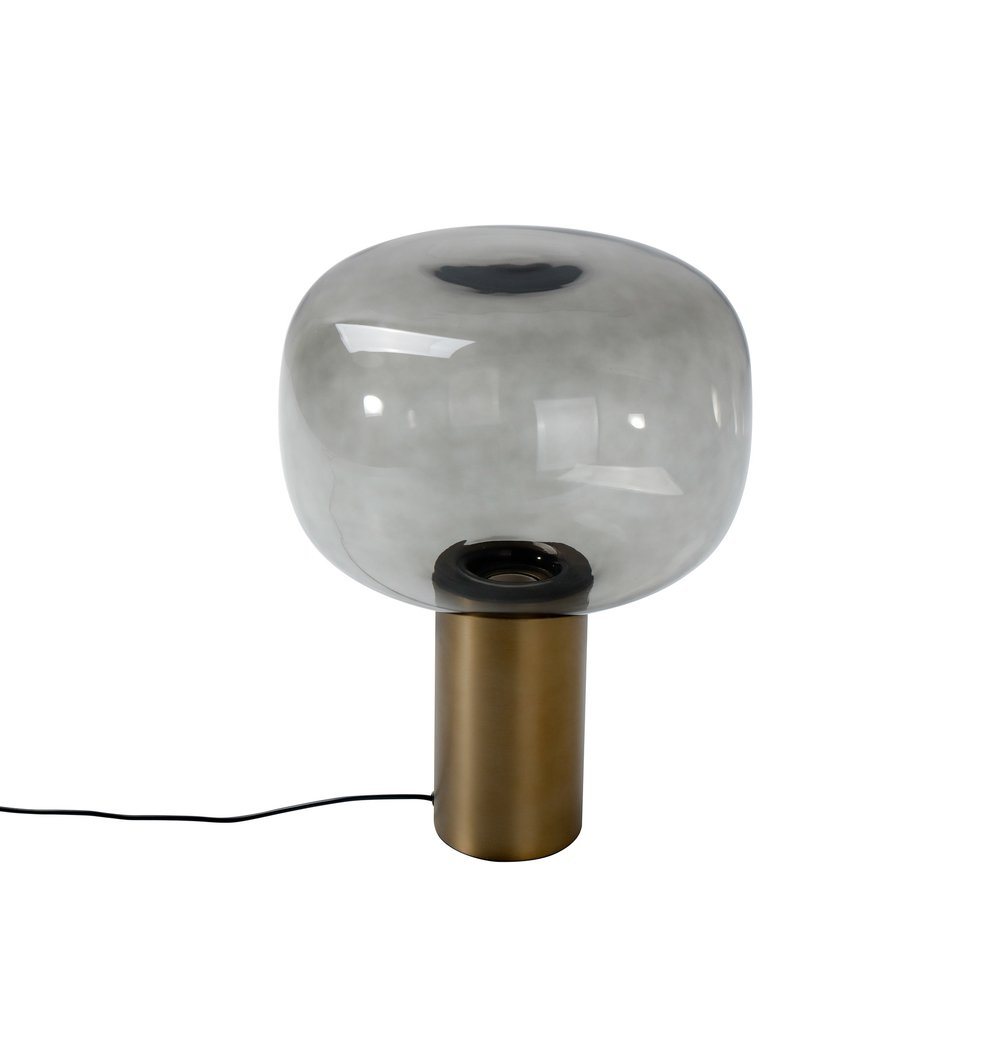 A Noak Table Lamp by ModernMazing with a brass base.