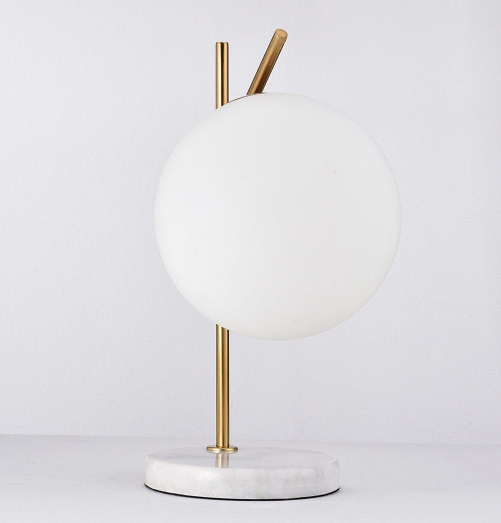 An Oda Marble Table Lamp with a marble base, manufactured by ModernMazing.