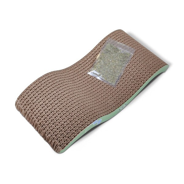 An image of a Van Ness Plastics Pureness Scratch'N Relax Cat Scratcher Scratching Pad Brown with a pillow on top of it.