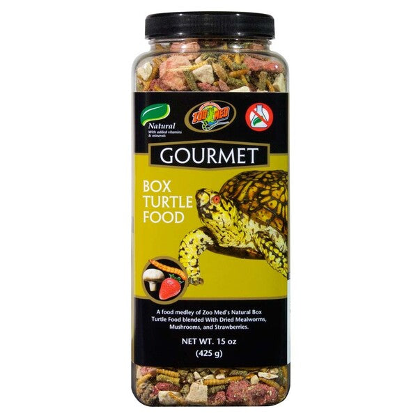 A jar of Zoo Med Gourmet Box Turtle Dry Food 15 oz containing dried mealworms on a white background.