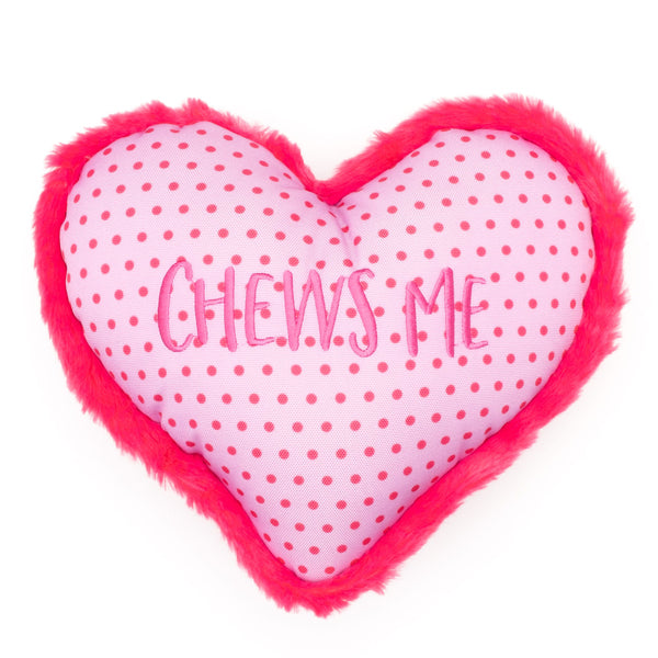 A durable Worthy Dog Chew Me Heart Pink Small toy for play.