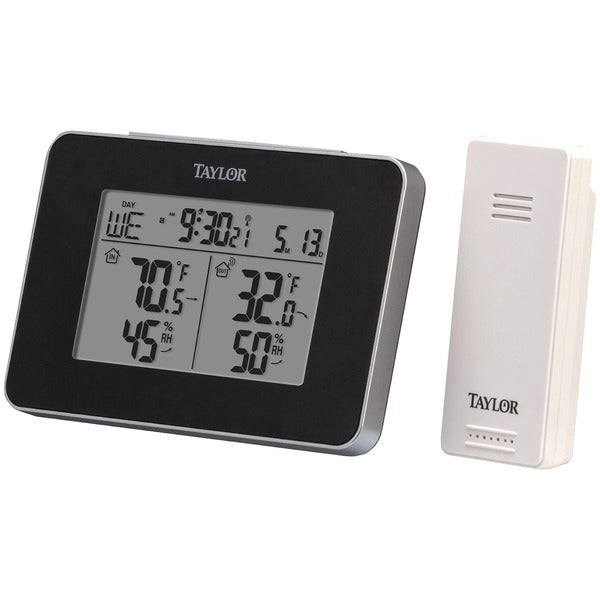 A Taylor Precision Products 1731 Wireless Indoor & Outdoor Weather Station with Hygrometer with a remote control.