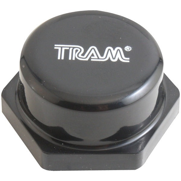 A black nut with the Tram 1290 NMO Rain Cap on it.