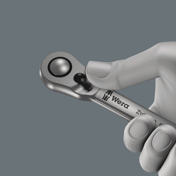 A Wera Zyklop 1/4 Metal Ratchet with a metal handle on a white background.