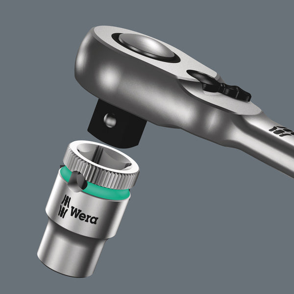 A Wera Zyklop 1/4 Metal Ratchet with a metal handle on a white background.