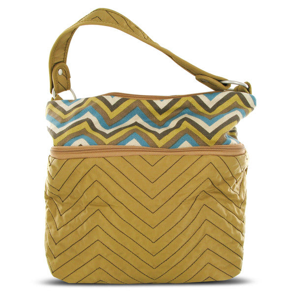 A bag with a Travelon Quilted Nylon Zip-Top Train Case - Tan/Zig Zag Pattern on it.