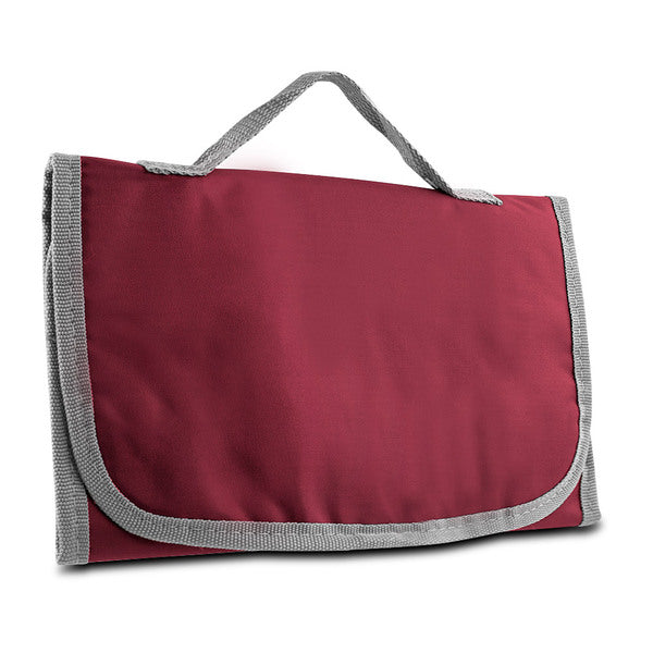 A burgundy and grey Travelon Trip Logic Tri-Fold Toiletry Kit, Bordeaux on a white background.