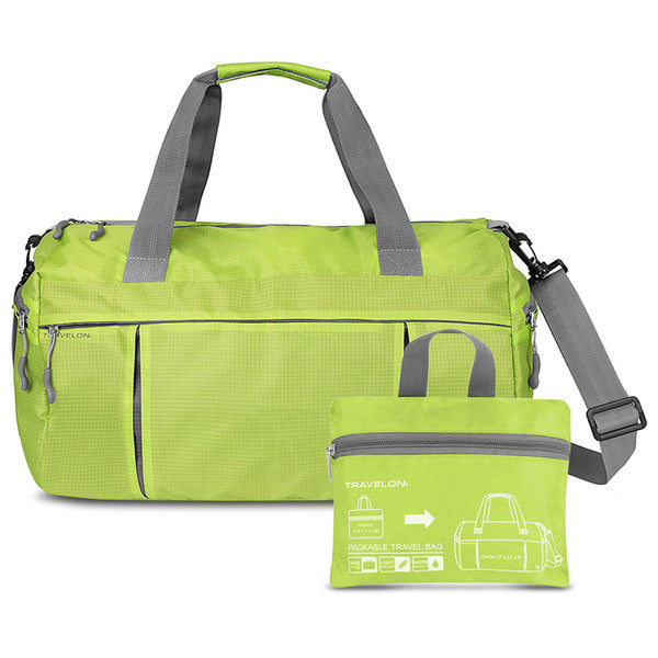 A Travelon Featherweight Packable Travel Bag, Lime with a zippered pocket.