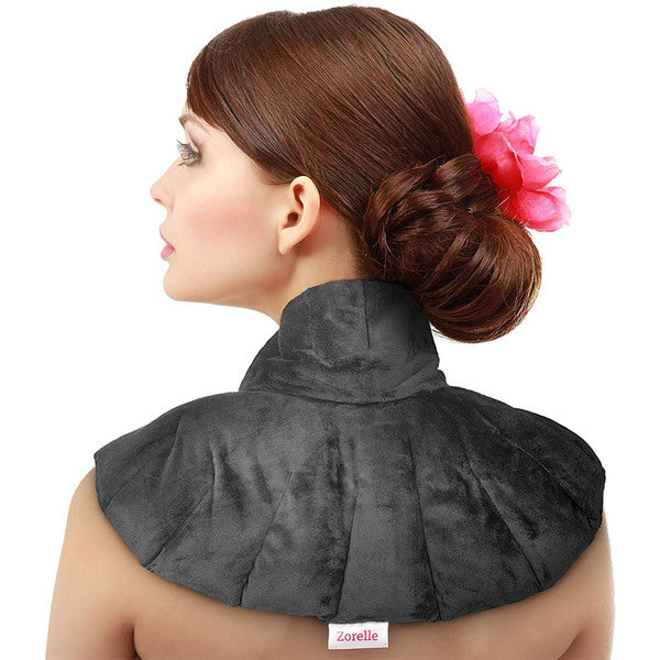 The back of a woman wearing a ZORELLE Heating Pad for Neck and Shoulders: Heated Neck Wrap Microwavable - Hot and Warm Compress Therapy.